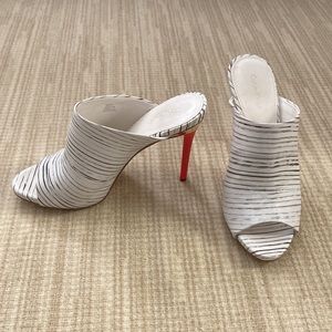 Calvin Klein high heel slides size 9.